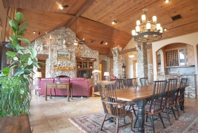 Stunning custom home on gorgeous 35.04 acres (per plat) within