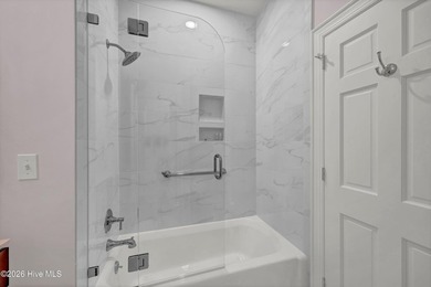 Coveted Landfall townhouse condominium in Colony Club! This end