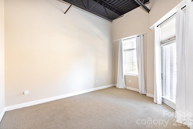 Experience elevated SouthPark living in this stylish one-bedroom - photo 4