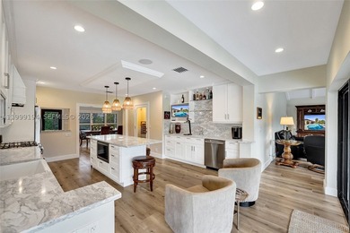The finest Fully Renovated waterfront home in Coral Ridge with - photo 1