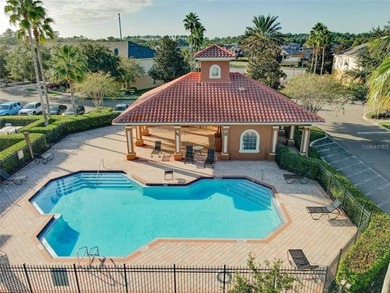 This beautiful townhouse is located in the gated community of - photo 3