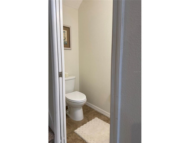 This beautiful townhouse is located in the gated community of - photo 10