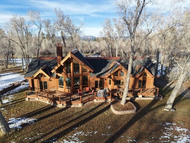 This unique property features a beautiful 2,678 Sq Ft custom log - photo 13
