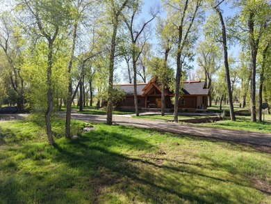 This unique property features a beautiful 2,678 Sq Ft custom log - photo 14