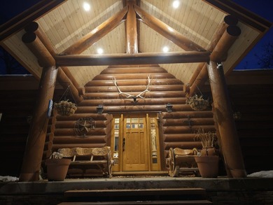 This unique property features a beautiful 2,678 Sq Ft custom log - photo 25