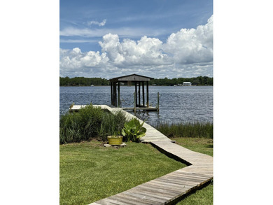 Blending relaxed elegance with unmistakable waterfront charm - photo 6