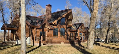 This unique property features a beautiful 2,678 Sq Ft custom log - photo 26