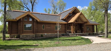 This unique property features a beautiful 2,678 Sq Ft custom log - photo 27