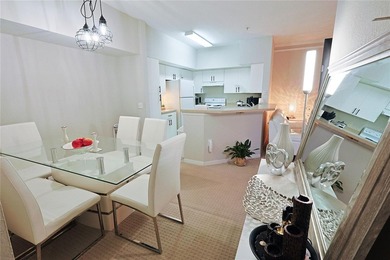 Welcome to this charming first-floor end-unit condominium - photo 3