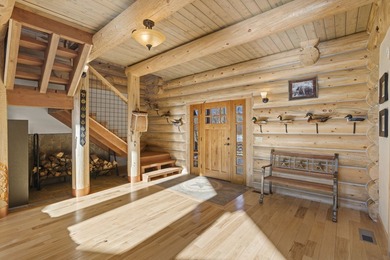 This unique property features a beautiful 2,678 Sq Ft custom log - photo 33