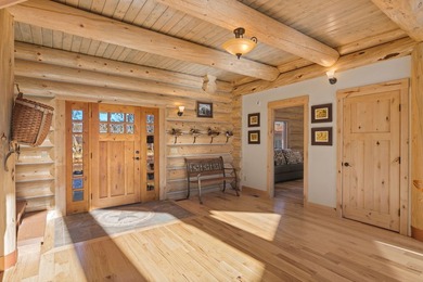 This unique property features a beautiful 2,678 Sq Ft custom log - photo 35