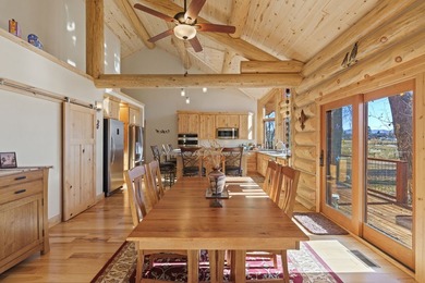 This unique property features a beautiful 2,678 Sq Ft custom log - photo 37