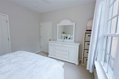 Welcome to this charming first-floor end-unit condominium - photo 8