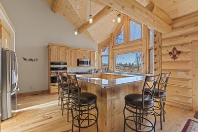This unique property features a beautiful 2,678 Sq Ft custom log - photo 38