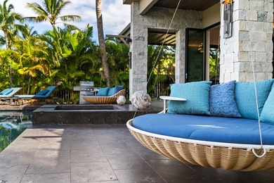 Sunlight and ocean breezes flow through 21 feet of bi-folding - photo 38