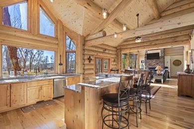 This unique property features a beautiful 2,678 Sq Ft custom log - photo 39