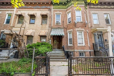 Welcome to this well-maintained 2-family brick home located in - photo 2
