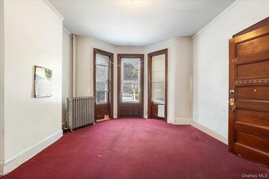 Welcome to this well-maintained 2-family brick home located in - photo 3