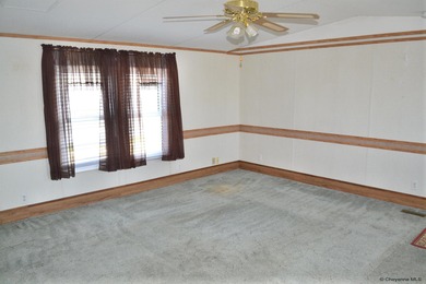 This clean well-maintained 3-bedroom 2-bath mobile home offers
