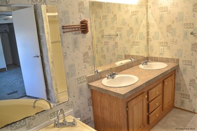 This clean well-maintained 3-bedroom 2-bath mobile home offers