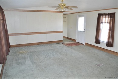 This clean well-maintained 3-bedroom 2-bath mobile home offers