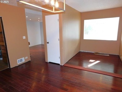 Step into the welcoming entryway, where gleaming hardwood floors - photo 11