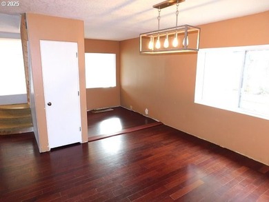 Step into the welcoming entryway, where gleaming hardwood floors - photo 12