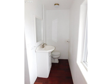 Step into the welcoming entryway, where gleaming hardwood floors - photo 15