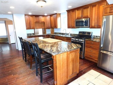 Step into the welcoming entryway, where gleaming hardwood floors - photo 18