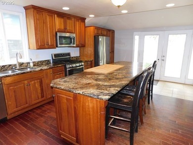 Step into the welcoming entryway, where gleaming hardwood floors - photo 20