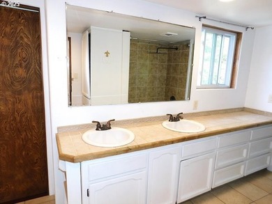 Step into the welcoming entryway, where gleaming hardwood floors - photo 21