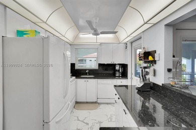 PRISTINE CONDITION and TOTALLY REMODELED unit in this IDEAL - photo 26