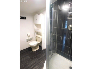 Step into the welcoming entryway, where gleaming hardwood floors - photo 28