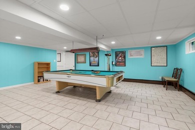Set in the sought after water oriented community of Arundel - photo 34