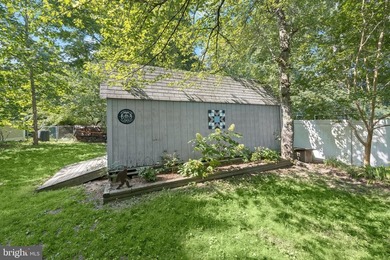 Set in the sought after water oriented community of Arundel - photo 50
