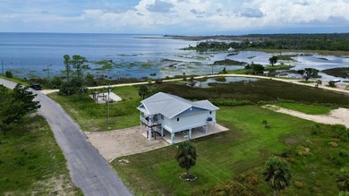 Experience the finest of coastal living with this fully - photo 2