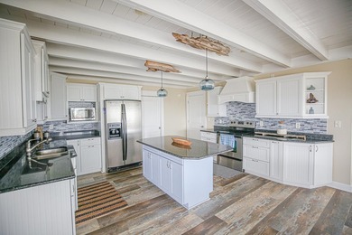 Experience the finest of coastal living with this fully - photo 7