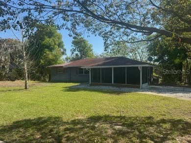 Welcome to this charming 3-bedroom, 2-bathroom pool home located - photo 1