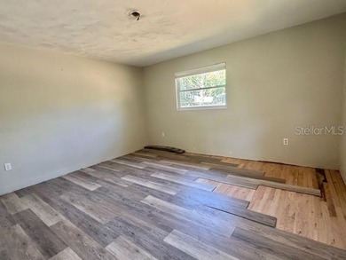 Welcome to this charming 3-bedroom, 2-bathroom pool home located - photo 10