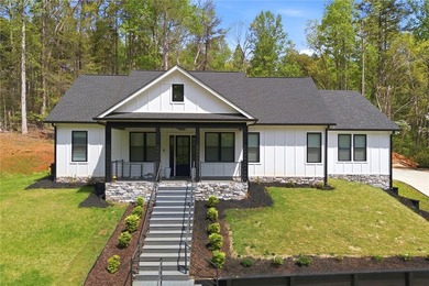 Beautiful move-in ready home featuring modern finishes, lake - photo 1