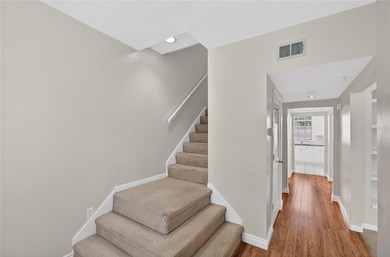 FRESHLY PAINTED AND NEW CARPETING: Beautiful townhome-style - photo 26