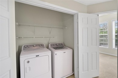 FRESHLY PAINTED AND NEW CARPETING: Beautiful townhome-style - photo 27