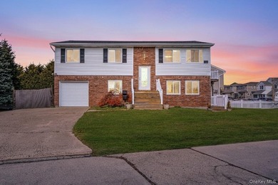 Welcome to 4 Bay Place, a spacious Hi-Ranch single-family home - photo 1