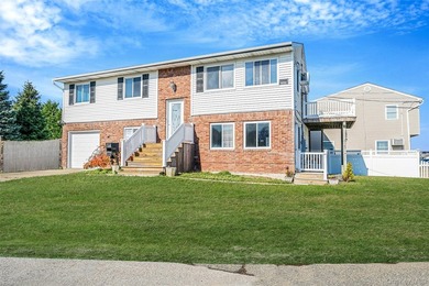 Welcome to 4 Bay Place, a spacious Hi-Ranch single-family home - photo 2