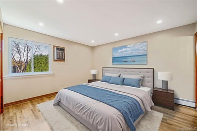 Welcome to 4 Bay Place, a spacious Hi-Ranch single-family home - photo 7