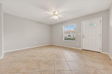 Freshly painted 2-bedroom, 2-bath townhome-style condo in a - photo 4