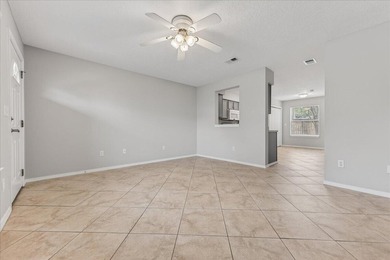 Freshly painted 2-bedroom, 2-bath townhome-style condo in a - photo 6