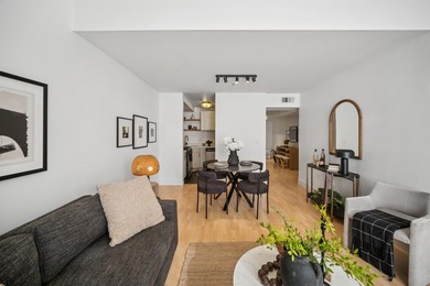 Welcome to Midtown Lofts! This chic, two-story condo unit boasts