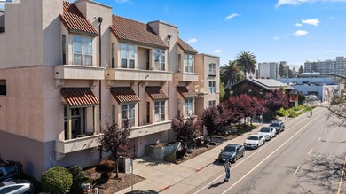 Welcome to Midtown Lofts! This chic, two-story condo unit boasts