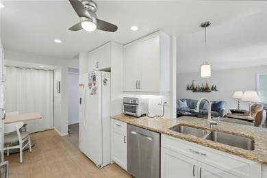 You are going to love this delightful waterfront condominium - photo 7